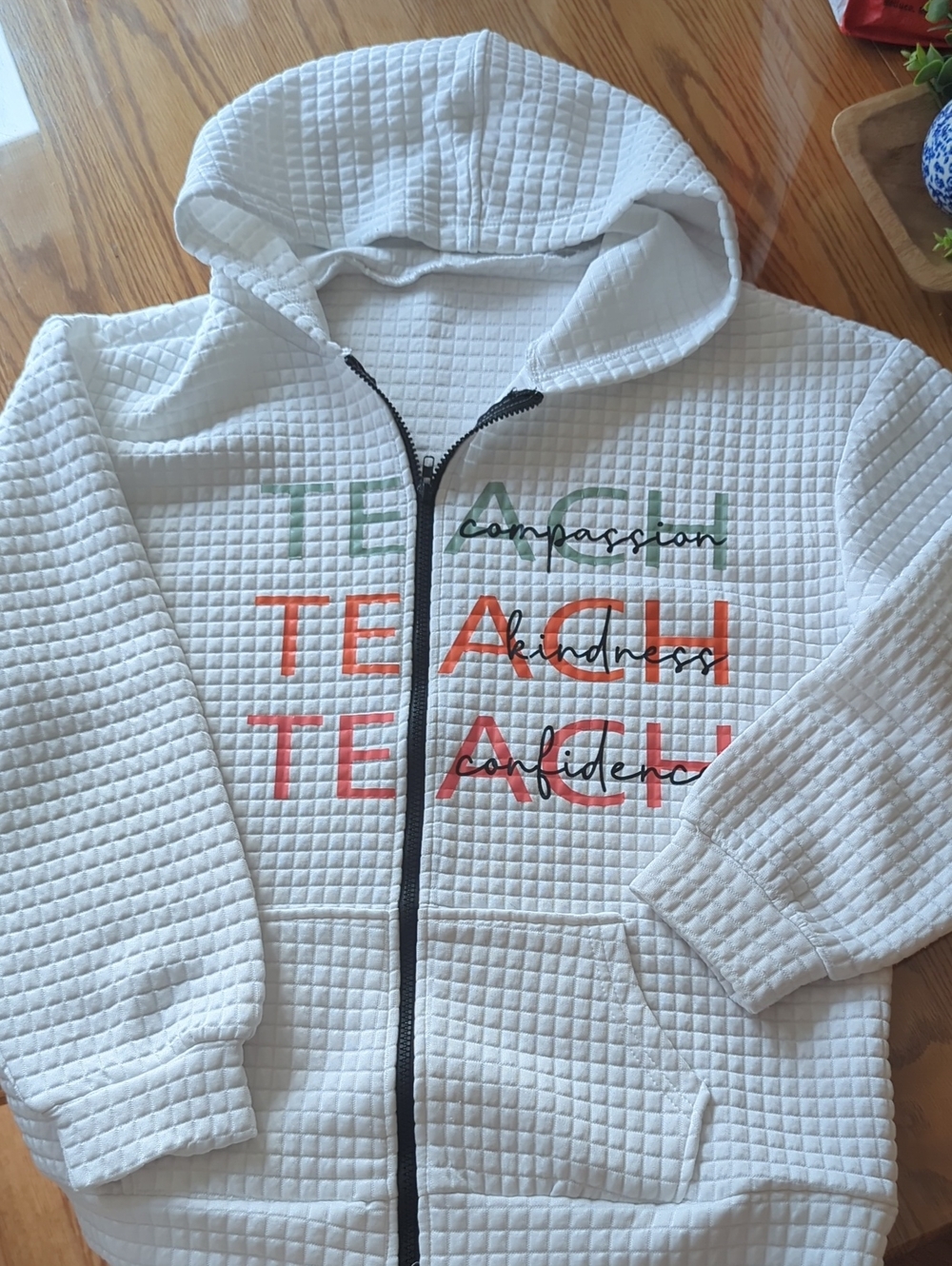 White Quilted  Zip Hoodie with Positive Message  Teacher. Teaching